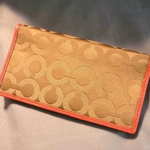 PEACH AND BROWN COACH CHECK BOOK COVER LIKE NEW